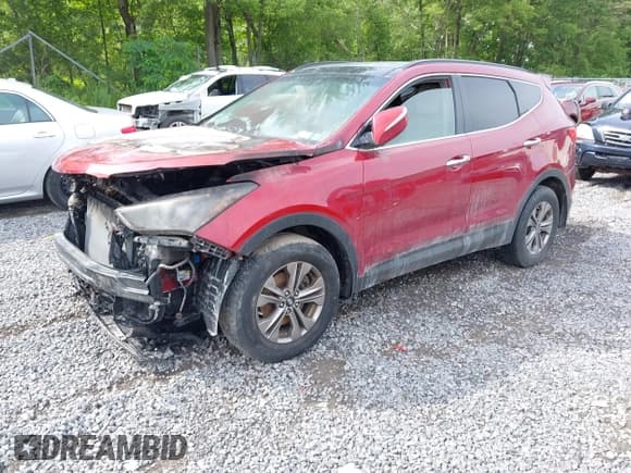 ✅ 2015 Hyundai Santa Fe • VIN: 5XYZUDLB4FG294425 • Lot: 42642628. Listed on IAAI with 89,000 mi. Free auction sales archive from the USA and detailed vehicle history report at DreamBid. Image 2.