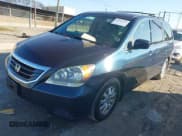 ✅ 2010 Honda Odyssey EX-L • VIN: 5FNRL3H74AB058097 • Lot: 43907585. Listed on IAAI with 177,309 mi. Free auction sales archive from the USA and detailed vehicle history report at DreamBid. Image 2.