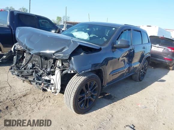 ✅ 2018 Jeep Grand Cherokee Laredo E • VIN: 1C4RJEAGXJC124726 • Lot: 41990741. Listed on IAAI with 112,217 mi. Free auction sales archive from the USA and detailed vehicle history report at DreamBid. Image 2.