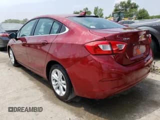 ✅ 2019 Chevrolet Cruze LT • VIN: 1G1BE5SM9K7140221 • Lot: 57411523. Listed on Copart with 97,731 mi. Free auction sales archive from the USA and detailed vehicle history report at DreamBid. Image 2.