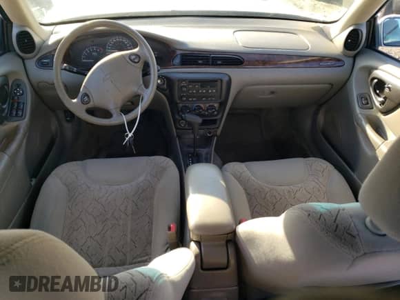 2003 Chevrolet Malibu LS z VIN 1G1NE52J33M645029, wystawiony jako Copart lot #46827045 z przebiegiem Nie podano mil oraz Czysty tytuł • Clean title. Historia ofert i sprzedaży dostępna na DreamBid. Obrazek 8.