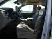 2015 Chevrolet Tahoe LTZ with VIN 1GNSKCKC1FR118128, listed as a Copart auction lot 89589135 with 129,932 mi miles and Salvage title. Bid and sale history available at DreamBid. Image 7.