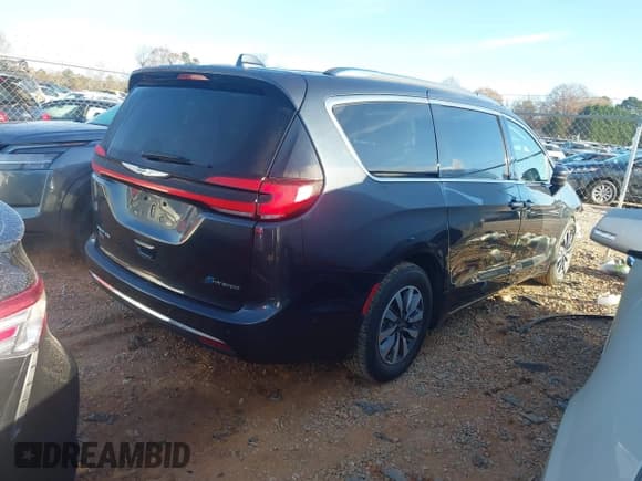 ✅ 2021 Chrysler Pacifica Hybrid Touring L • VIN: 2C4RC1L72MR594048 • Lot: 43772581. Listed on IAAI with 115,553 mi. Free auction sales archive from the USA and detailed vehicle history report at DreamBid. Image 4.