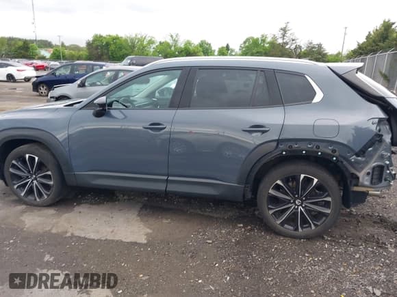 ✅ 2023 Mazda CX-50 S Premium Plus • VIN: 7MMVABEM6PN105424 • Lot: 42148825. Wystawiony na IAAI z przebiegiem 40 434 mil. Bezpłatny archiwum sprzedaży aukcyjnych z USA i szczegółowy raport historii pojazdu na DreamBid. Zdjęcie 15.