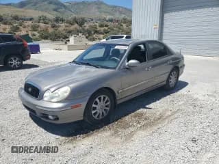 ✅ 2003 Hyundai Sonata GLS • VIN: KMHWF35H33A868884 • Lot: 61442535. Listed on Copart with 129,900 mi. Free auction sales archive from the USA and detailed vehicle history report at DreamBid. Image 1.