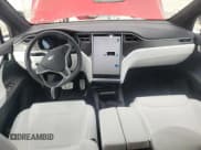 ✅ 2017 Tesla Model X P90D • VIN: 5YJXCAE40HF074961 • Lot: 52598084. Listed on Copart with Not provided. Free auction sales archive from the USA and detailed vehicle history report at DreamBid. Image 8.