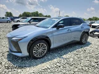 ✅ 2024 Lexus RZ 450e Premium • VIN: JTJAAAABXRA024088 • Lot: 63831695. Listed on Copart with 11,784 mi. Free auction sales archive from the USA and detailed vehicle history report at DreamBid. Image 1.