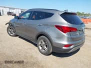 ✅ 2018 Hyundai Santa Fe 2.4L • VIN: 5NMZU3LB5JH103569 • Лот: 43236125. Опубликован ранее на IAAI с пробегом 67 120 миль. Бесплатный доступ к архиву аукционных продаж из США и подробный отчёт об истории автомобиля на DreamBid. Изображение 3.