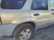 ✅ 2003 Ford Escape XLT Popular 2 • VIN: 1FMCU93163KA62727 • Lot: 43903448. Listed on IAAI with 227,438 mi. Free auction sales archive from the USA and detailed vehicle history report at DreamBid. Image 6.