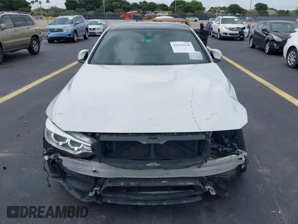 ✅ 2017 BMW M4 • VIN: WBS3R9C32HK710099 • Lot: 42654428. Listed on IAAI with 69,774 mi. Free auction sales archive from the USA and detailed vehicle history report at DreamBid. Image 12.