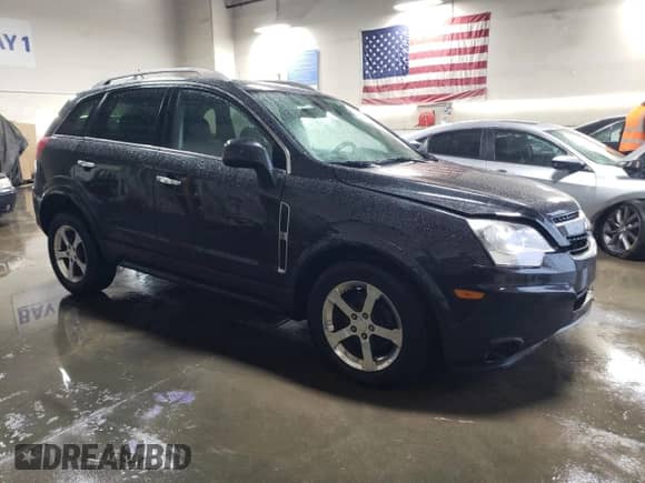 2012 Chevrolet Captiva Sport LT with VIN 3GNAL3E55CS635463, listed as a Copart auction lot 79453914 with 180,289 mi miles and Salvage title. Bid and sale history available at DreamBid. Image 4.