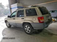 ✅ 2001 Jeep Grand Cherokee Laredo • VIN: 1J4GX48S31C504494 • Лот: 94961115. Опубликован ранее на Copart с пробегом Не указан. Бесплатный доступ к архиву аукционных продаж из США и подробный отчёт об истории автомобиля на DreamBid. Изображение 2.
