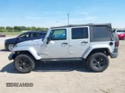 ✅ 2007 Jeep Wrangler Unlimited Sahara • VIN: 1J4GA591X7L101991 • Lot: 43233527. Listed on IAAI with 156,024 mi. Free auction sales archive from the USA and detailed vehicle history report at DreamBid. Image 14.