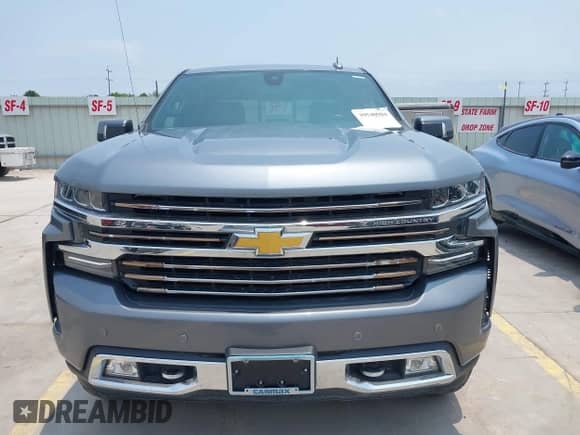 2019 Chevrolet Silverado 1500 High Country z VIN 3GCUYHED6KG169118, wystawiony jako IAAI lot #39540984 z przebiegiem 107 356 mil mil oraz . Historia ofert i sprzedaży dostępna na DreamBid. Obrazek 12.