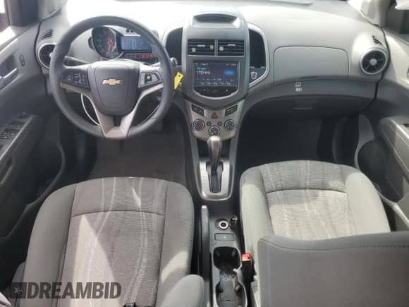 2016 Chevrolet Sonic LT с VIN 1G1JC6SH9G4132221, выставлен на аукционе Copart как лот 69777154 с пробегом 132 915 миль миль и Списание • Salvage title. История ставок и продаж доступна на DreamBid. Изображение 8.