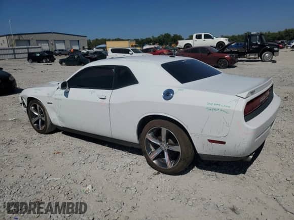 2014 Dodge Challenger SXT with VIN 2C3CDYAG8EH293293, listed as a Copart auction lot 81114225 with 158,577 mi miles and Salvage title. Bid and sale history available at DreamBid. Image 2.