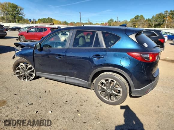 ✅ 2016 Mazda CX-5 Grand Touring • VIN: JM3KE2DY1G0662595 • Lot: 91919275. Wystawiony na Copart z przebiegiem Nie podano. Bezpłatny archiwum sprzedaży aukcyjnych z USA i szczegółowy raport historii pojazdu na DreamBid. Zdjęcie 2.