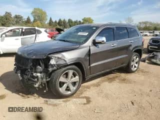 2014 Jeep Grand Cherokee Limited z VIN 1C4RJFBG1EC425802, wystawiony jako Copart lot #84869645 z przebiegiem 220 656 mil mil oraz Szkoda całkowita • Salvage title. Historia ofert i sprzedaży dostępna na DreamBid. Obrazek 1.