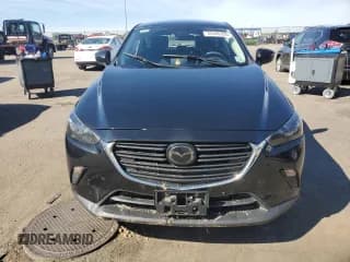 ✅ 2021 Mazda CX-3 Sport • VIN: JM1DKFB72M1515798 • Лот: 85940325. Опубликован ранее на Copart с пробегом 61 239 миль. Бесплатный доступ к архиву аукционных продаж из США и подробный отчёт об истории автомобиля на DreamBid. Изображение 5.