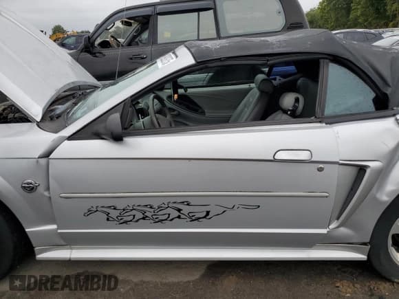 ✅ 2004 Ford Mustang Deluxe • VIN: 1FAFP44614F132706 • Лот: 80920275. Опубликован ранее на Copart с пробегом 137 564 миль. Бесплатный доступ к архиву аукционных продаж из США и подробный отчёт об истории автомобиля на DreamBid. Изображение 7.