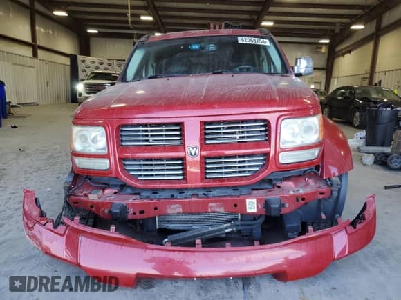 2011 Dodge Nitro Shock with VIN 1D4PT7GX5BW565879, listed as a Copart auction lot 82068754 with 148,954 mi miles and Salvage title. Bid and sale history available at DreamBid. Image 5.