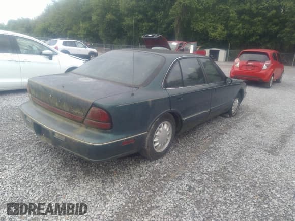 ✅ 1998 Oldsmobile 88 LS • VIN: 1G3HN52K5W4849011 • Lot: 42153650. Listed on IAAI with 171,969 mi. Free auction sales archive from the USA and detailed vehicle history report at DreamBid. Image 4.