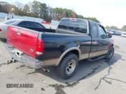 ✅ 1999 Ford F-150 • VIN: 1FTRX17WXXNA68533 • Lot: 43780364. Listed on IAAI with Not provided. Free auction sales archive from the USA and detailed vehicle history report at DreamBid. Image 4.