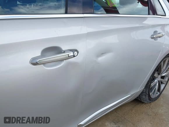 ✅ 2013 Cadillac XTS Livery • VIN: 2G61W5S38D9110591 • Lot: 43156880. Listed on IAAI with 420,217 mi. Free auction sales archive from the USA and detailed vehicle history report at DreamBid. Image 17.