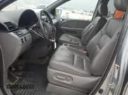 ✅ 2010 Honda Odyssey EX-L • VIN: 5FNRL3H79AB035026 • Lot: 45910525. Listed on Copart with 133,818 mi. Free auction sales archive from the USA and detailed vehicle history report at DreamBid. Image 7.