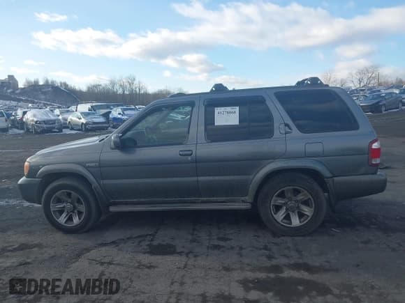 ✅ 2004 Nissan Pathfinder LE Platinum • VIN: JN8DR09Y94W900404 • Lot: 41278068. Wystawiony na IAAI z przebiegiem 167 587 mil. Bezpłatny archiwum sprzedaży aukcyjnych z USA i szczegółowy raport historii pojazdu na DreamBid. Zdjęcie 14.