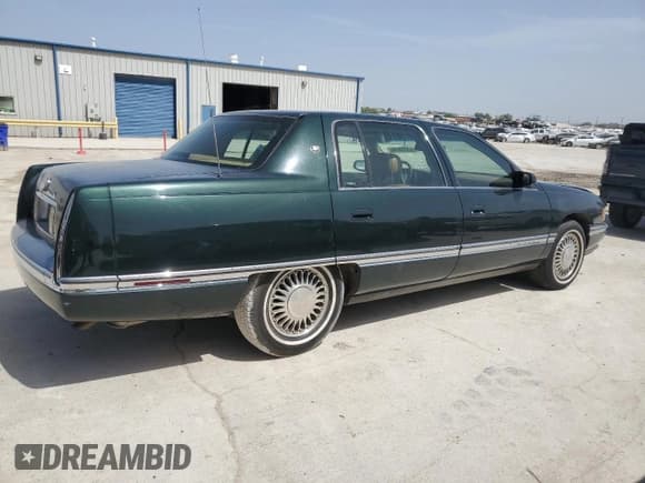 ✅ 1994 Cadillac DeVille • VIN: 1G6KD52B7RU265791 • Lot: 65560084. Listed on Copart with 123,834 mi. Free auction sales archive from the USA and detailed vehicle history report at DreamBid. Image 3.
