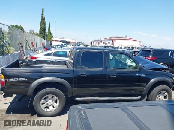✅ 2004 Toyota Tacoma PreRunner • VIN: 5TEGN92N94Z407298 • Lot: 42923295. Listed on IAAI with 128,249 mi. Free auction sales archive from the USA and detailed vehicle history report at DreamBid. Image 14.