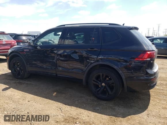 ✅ 2023 Volkswagen Tiguan SE R-Line Black • VIN: 3VV8B7AXXPM071863 • Лот: 55653325. Опубликован ранее на Copart с пробегом 12 054 миль. Бесплатный доступ к архиву аукционных продаж из США и подробный отчёт об истории автомобиля на DreamBid. Изображение 2.