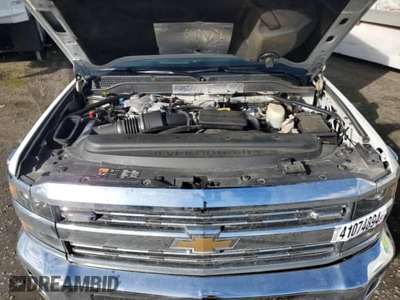 2017 Chevrolet Silverado 3500HD LT с VIN 1GB3KZCY6HF230118, выставлен на аукционе Copart как лот 41074894 с пробегом Не указан миль и Списание • Salvage title. История ставок и продаж доступна на DreamBid. Изображение 11.