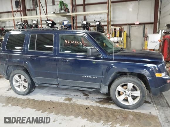 ✅ 2014 Jeep Patriot Latitude • VIN: 1C4NJRFB0ED730765 • Lot: 42309571. Listed on IAAI with 218,577 mi. Free auction sales archive from the USA and detailed vehicle history report at DreamBid. Image 13.