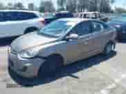 2014 Hyundai Accent GLS with VIN KMHCT4AE8EU655136, listed as a IAAI auction lot 42797016 with 102,554 mi miles and . Bid and sale history available at DreamBid. Image 2.