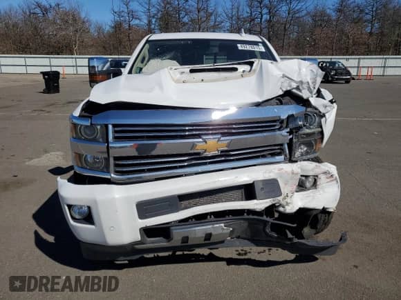 2017 Chevrolet Silverado 2500HD High Country с VIN 1GC1KXEY6HF228955, выставлен на аукционе Copart как лот 49278015 с пробегом Не указан миль и Списание • Salvage title. История ставок и продаж доступна на DreamBid. Изображение 5.