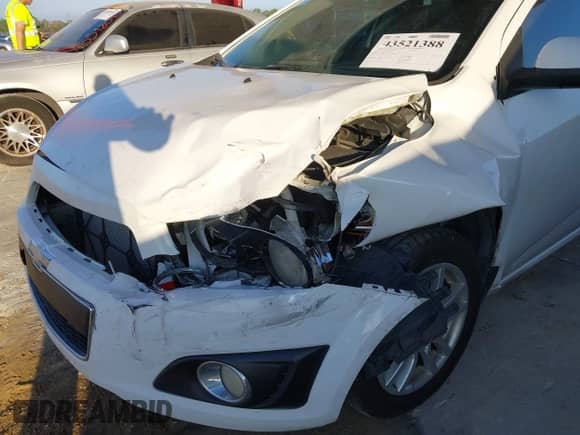 2014 Chevrolet Sonic LT with VIN 1G1JC5SG9E4127762, listed as a IAAI auction lot 43521388 with 128,333 mi miles and . Bid and sale history available at DreamBid. Image 6.