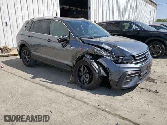 ✅ 2022 Volkswagen Tiguan SE • VIN: 3VV2B7AX8NM129763 • Lot: 55157405. Listed on Copart with 26,536 mi. Free auction sales archive from the USA and detailed vehicle history report at DreamBid. Image 4.