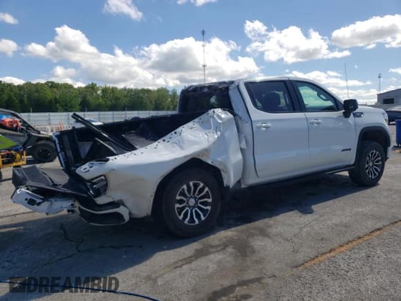 ✅ 2022 GMC Sierra 1500 AT4 • VIN: 1GTU9EET9NZ186504 • Лот: 57037445. Опубликован ранее на Copart с пробегом 105 026 миль. Бесплатный доступ к архиву аукционных продаж из США и подробный отчёт об истории автомобиля на DreamBid. Изображение 3.