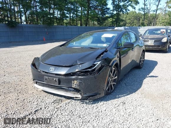 ✅ 2024 Toyota Prius SE • VIN: JTDACACU4R3039329 • Lot: 42947351. Listed on IAAI with 6,167 mi. Free auction sales archive from the USA and detailed vehicle history report at DreamBid. Image 2.