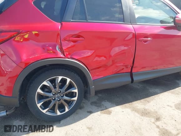 ✅ 2016 Mazda CX-5 Grand Touring • VIN: JM3KE4DY4G0781687 • Lot: 43574515. Wystawiony na IAAI z przebiegiem 79 682 mil. Bezpłatny archiwum sprzedaży aukcyjnych z USA i szczegółowy raport historii pojazdu na DreamBid. Zdjęcie 19.