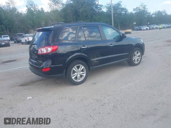 2011 Hyundai Santa Fe Limited с VIN 5XYZKDAG7BG055336, выставлен на аукционе IAAI как лот 42875695 с пробегом 92 567 миль миль и . История ставок и продаж доступна на DreamBid. Изображение 4.
