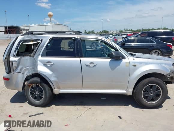 2010 Mercury Mariner z VIN 4M2CN8B75AKJ13322, wystawiony jako IAAI lot #42832064 z przebiegiem 205 074 mil mil oraz . Historia ofert i sprzedaży dostępna na DreamBid. Obrazek 14.