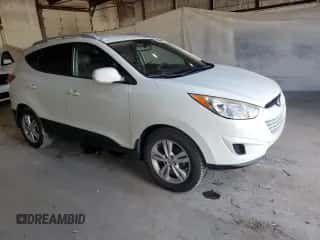 2011 Hyundai Tucson GLS with VIN KM8JU3AC0BU128555, listed as a Copart auction lot 86261275 with 177,820 mi miles and Salvage title. Bid and sale history available at DreamBid. Image 4.