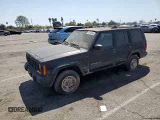 ✅ 1999 Jeep Cherokee Sport • VIN: 1J4FT68S0XL555883 • Lot: 51016255. Listed on Copart with 128,306 mi. Free auction sales archive from the USA and detailed vehicle history report at DreamBid. Image 1.