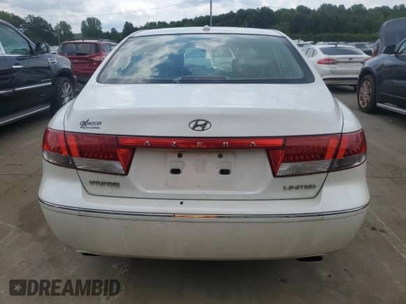 2007 Hyundai Azera SE с VIN KMHFC46F47A216700, выставлен на аукционе Copart как лот 64715524 с пробегом 117 819 миль миль и Списание • Salvage title. История ставок и продаж доступна на DreamBid. Изображение 6.