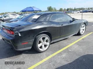 ✅ 2012 Dodge Challenger SXT • VIN: 2C3CDYAG1CH186518 • Lot: 41261555. Wystawiony na IAAI z przebiegiem Nie podano. Bezpłatny archiwum sprzedaży aukcyjnych z USA i szczegółowy raport historii pojazdu na DreamBid. Zdjęcie 4.