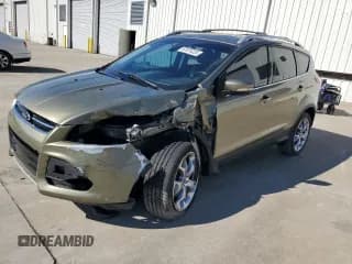 ✅ 2013 Ford Escape Titanium • VIN: 1FMCU0J90DUB50585 • Lot: 87074225. Listed on Copart with 130,554 mi. Free auction sales archive from the USA and detailed vehicle history report at DreamBid. Image 1.