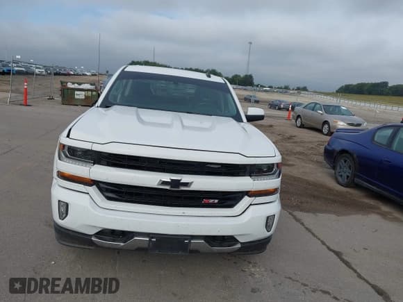✅ 2018 Chevrolet Silverado 1500 LT • VIN: 3GCUKREC8JG443934 • Lot: 43266162. Listed on IAAI with 79,404 mi. Free auction sales archive from the USA and detailed vehicle history report at DreamBid. Image 12.
